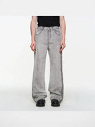 BLINDNOPLAN Side Pleated Distressed Jeans in Gray - On Model