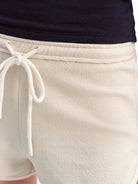 PUKI Heavyweight Cotton Blend Sweat Shorts in Apricot - On Model