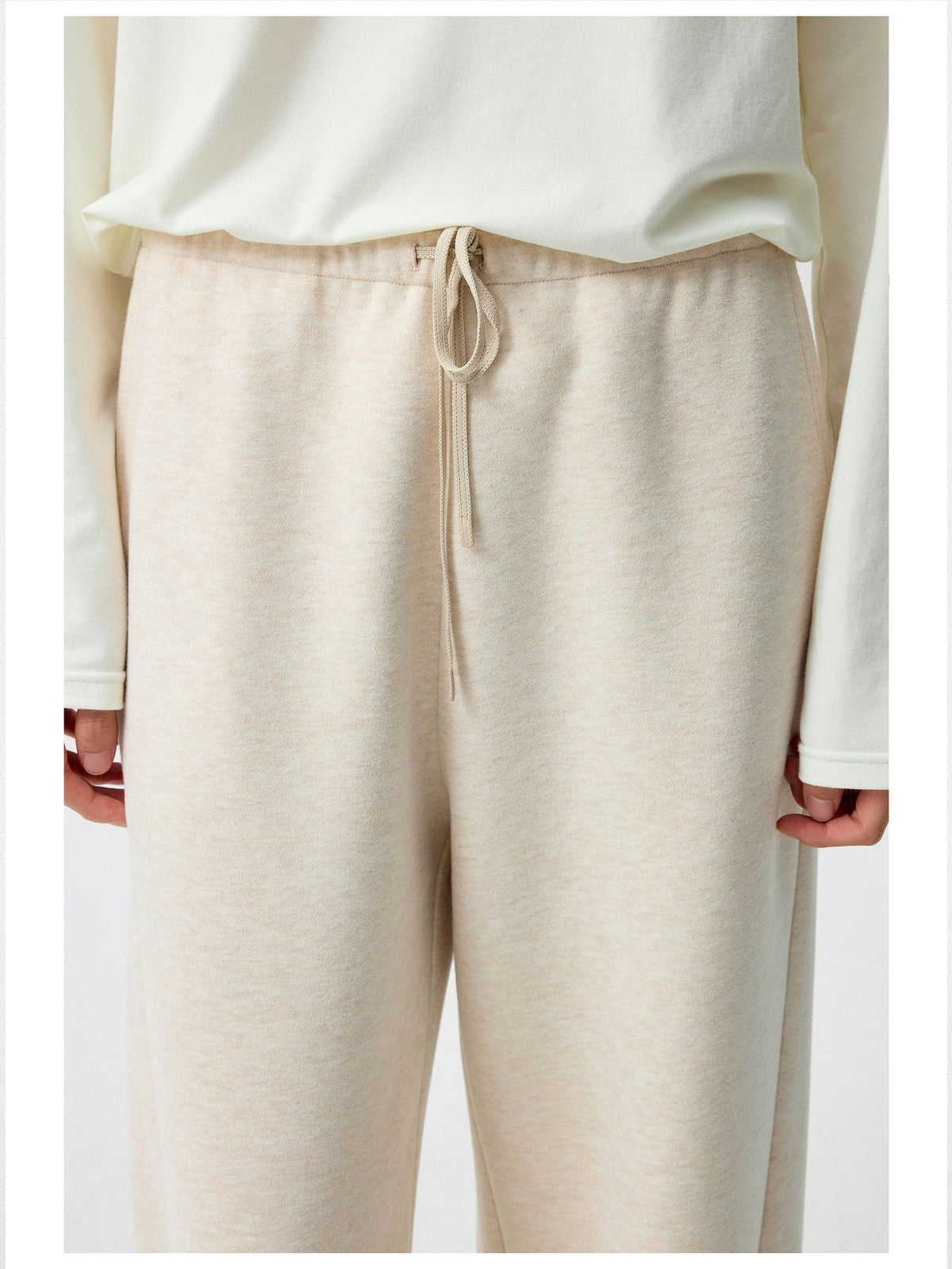 Simple Project Curved Seam Drawstring Sweatpants in Beige - On Model