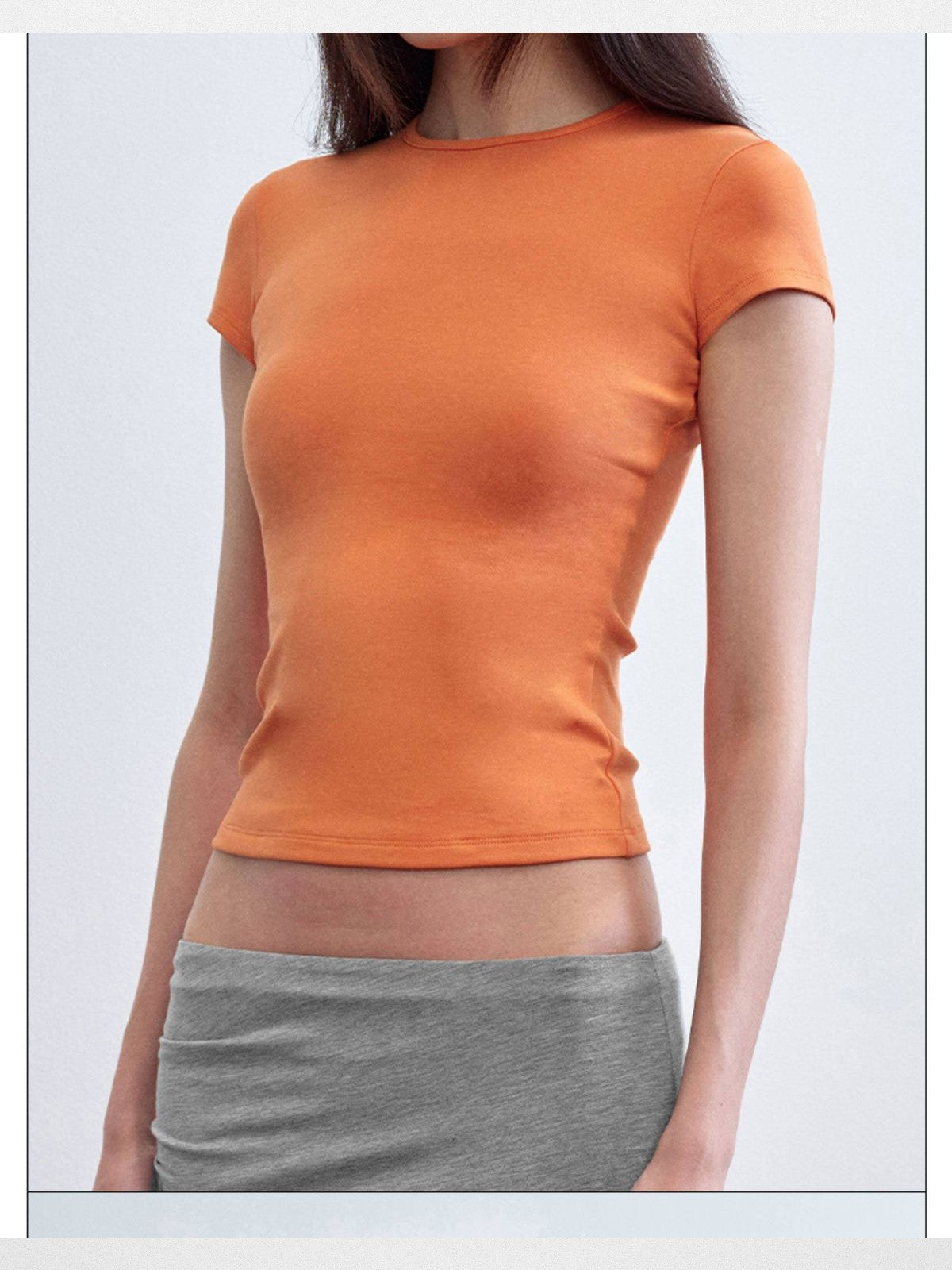 RARELY ALIKE Hourglass Cotton Crew Neck Tee in Orange - On Model