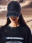 UNKNOWNWORLD Distressed Paint Splatter Cap in Black - On Model