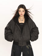 BIGGOLD STUDIO Layered Hooded Faux Leather Bomber in Gray - On Model #color_gray