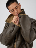 Simple Project Faux Leather Shearling Jacket in Black - On Male Model