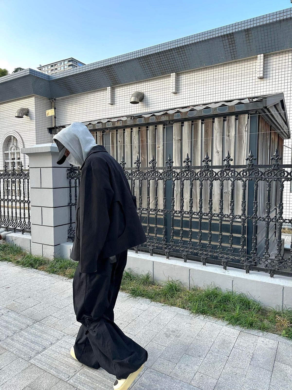 TRIANGLE PROJECT Deconstructed Origami Flare Pants in Black - On Model