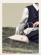 Songmont Mini Leather Bowling Bag in Pink - On Model