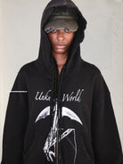 UNKNOWNWORLD Distressed Bat Print Zip Up Hoodie in Black - On Model