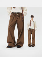 LOSTCTRL Button Front Straight Leg Trousers in Brown - On Model