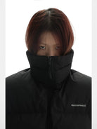 MASONPRINCE High Collar Down Puffer Vest in Black - On Model #color_black