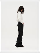 RARELY ALIKE Curved Leg Flared Suit Pants in Black - On Model