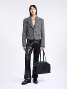 Grotto Vegetable Tanned Sheepskin Tote in Black - On Male Model