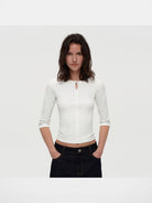 PUKI Lenzing Modal Bow Cutout 3 4 Sleeve Top in White - On Model