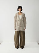 RandomPiece 100 Wool Openwork Tie Front Cardigan in Beige - On Model
