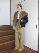 RARELY ALIKE Reversible Faux Fur Hooded Jacket in Black - On Model