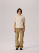 AFterTaste Garment Dyed Vintage Wash T Shirt in Cream - On Model