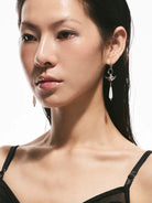 BLACKHEAD Manta Ray Mother of Pearl Drop Earrings in Silver - On Model