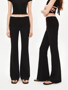 PUKI Ribbed Waist Micro Flare Pants in Black - On Model