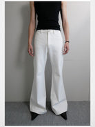 RARELY ALIKE Flared Cotton Denim Jeans in White - On Model