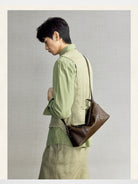 Songmont Vegetable Tanned Leather Hobo in Brown - On Model