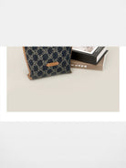 WANLIMA Leather Trimmed Monogram Denim Tote in Denim