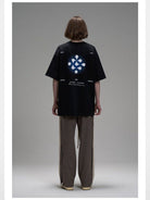 LOSTCTRL Heavyweight Graphic Print T Shirt in Black - On Female Model