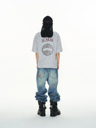 BLINDNOPLAN Puff Print Graphic T Shirt in Light Gray - On Male Model