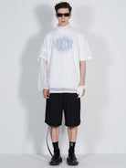 BLINDNOPLAN Dislocated Stripe Tailored Shorts in Black - On Model