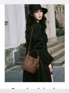 VINEY Split Leather Bucket Bag in Brown - On Female Model
