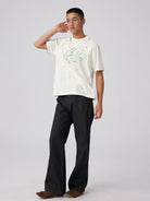 Simple Project Studded Script Logo T Shirt in White - On Male Model