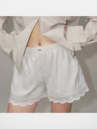 PUKI Lace Hem Track Shorts in Gray - On Model