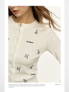 Ariseism Puppy Embroidered Knit Cardigan in White - On Model