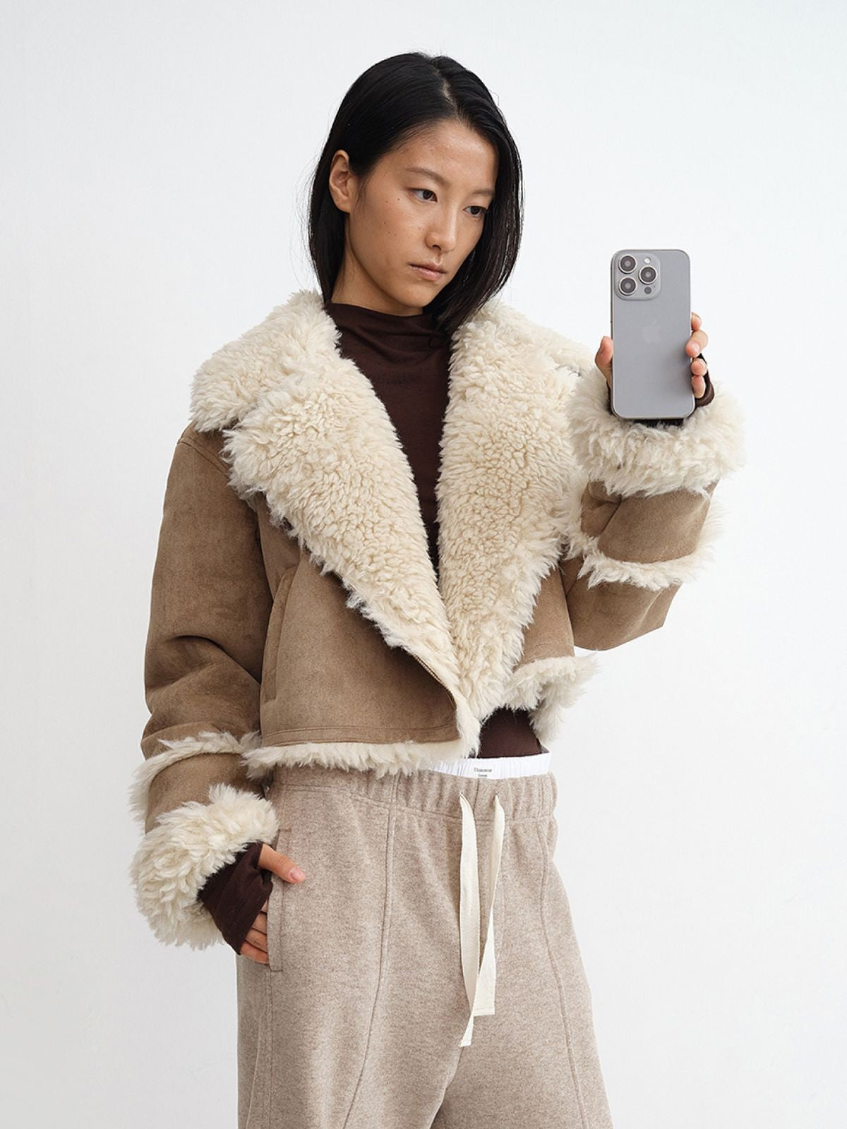 RARELY ALIKE Cropped Faux Shearling Moto Jacket in Khaki - On Model
