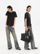 MASONPRINCE Distressed Boot Cut Washed Jeans in Blue - On Model #color_blue