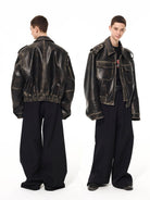 UNKNOWNWORLD Distressed Padded Eco Leather Jacket in Black - On Model