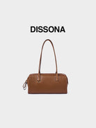DISSONA Vegetable Tanned Leather Baguette Bag in Brown