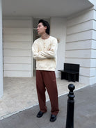 TRIANGLE PROJECT Ribbed Cotton Henley Sweatshirt in White - On Model