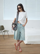 RARELY ALIKE Twisted Hem Cotton Silk Blend Tee in White - On Model