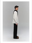 NANS Single Pleat Corduroy Micro Flare Trousers in Black - On Model