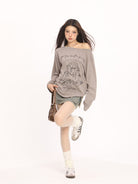 BIGGOLD STUDIO Graffiti Print Off Shoulder Tee in Beige - On Model #color_beige