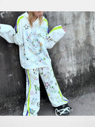 CFIERCE Graffiti Print Wide Leg Sweatpants in White - On Model