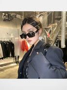 FUTURE UPDATE Cut Out Acetate Sunglasses in Black - On Female Model