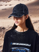 UNKNOWNWORLD Distressed Paint Splatter Cap in Black - On Model