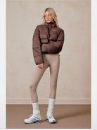 PUKI Cropped White Duck Down Puffer in Brown - On Model