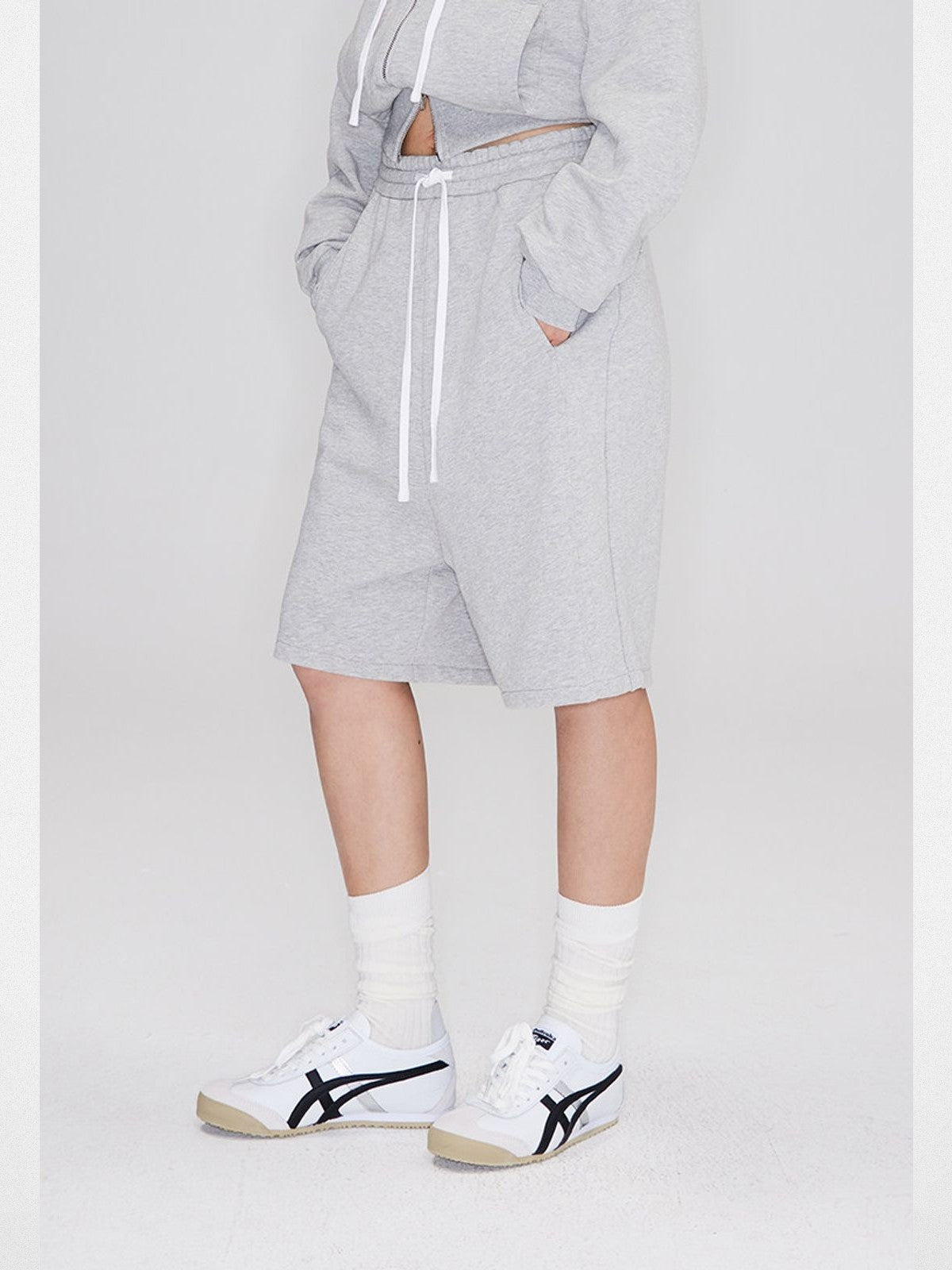 RARELY ALIKE Seamed Cotton Sweat Shorts in Gray - On Model