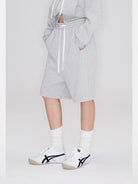 RARELY ALIKE Seamed Cotton Sweat Shorts in Gray - On Model