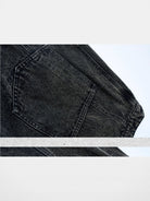 Amee Asymmetrical Waist Wide Leg Jeans in Black - Detail