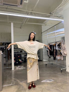 NeverSeez Snake Bow Print T Shirt in White - On Model