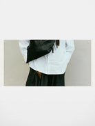 Songmont Broken Shell Leather Crossbody Hobo in Black - On Model