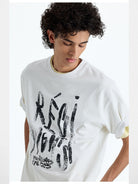 Nans Hand Distressed Graphic Cotton Tee in White - On Model