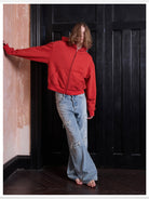 VLABMADE Distressed Sashiko Flare Jeans in Blue - On Model