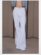 RARELY ALIKE Flared Cotton Denim Jeans in White - On Model